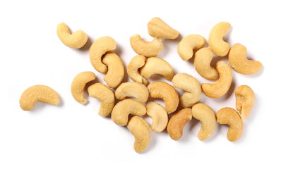 Salted cashew nuts isolated on white background, top view