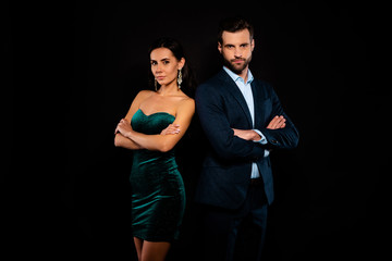 Close up photo amazing colleagues pair she her chic he him his macho stand back to back arms crossed best partnership wear blue costume jacket green glossy velvet dress isolated black background