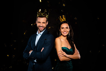 Portrait of his he her she nice-looking classy fascinating attractive adorable luxurious smart cheerful cheery two person flying decorative elements folded arms dream isolated on black background © deagreez