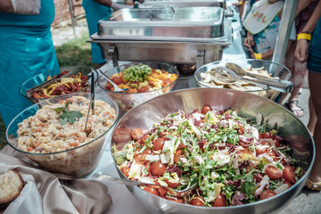 Catering for birthday party, wedding, event. Grilling meat, corn, burger, sausage, sunflower, vegetables. Fruit Dishes, Dessert, Salads, Pasta, Sweets