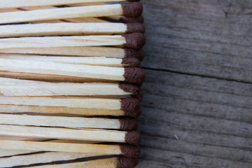 matches on a gray wooden board, macro shooting