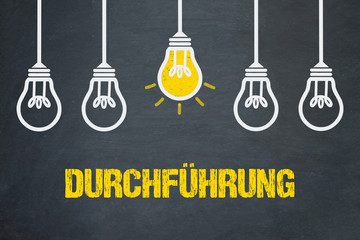 Durchführung / Tafel mit Glühbirnen