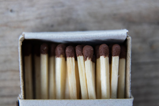 matches on a gray wooden board, macro shooting