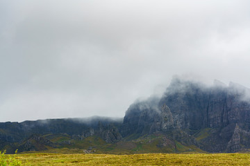 Early morning fog covers The Old Man of Storr , Isle of Skye , Scotland