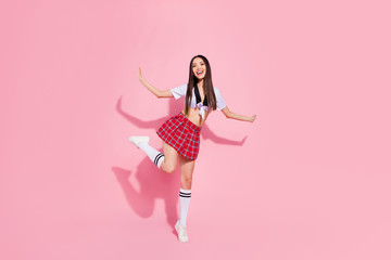 Fototapeta na wymiar Full length body size view of her she nice-looking attractive charming shine lovely slender cheerful cheery glad straight-haired lady having fun hanging out isolated over pink pastel background