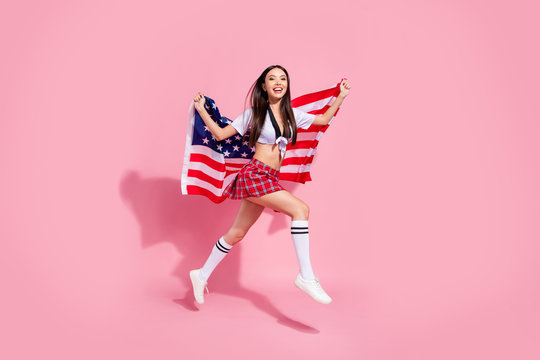 Full photo of pretty lady tradition carry united states flag run champion wear white top short plaid skirt isolated pink background