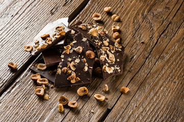 hazelnut dark chocolate pieces on wooden table