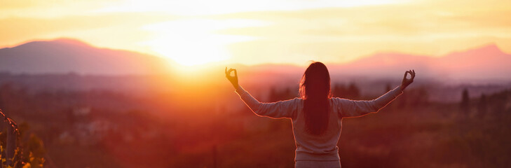 Yoga Woman Meditating At Sunset