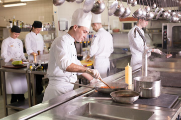 the work of the cook in the kitchen of the restaurant.