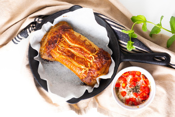 Food concept Fresh baked homemade ham cheese pie in skillet iron cast with copy space