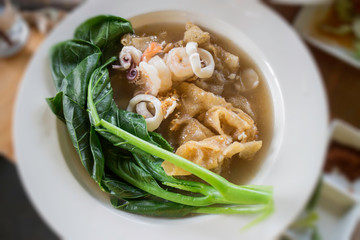 Thai noodle with seafood in gravy