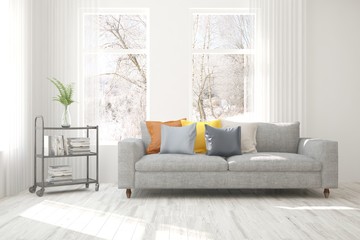 Stylish room in white color with sofa and winter landscape in window. Scandinavian interior design. 3D illustration