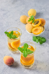 Apricot mint green tea. Selective focus, space for text.