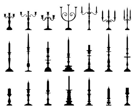 Black silhouettes of candlesticks on a white background