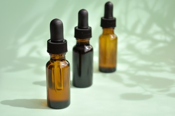 Beauty products from nature, aromatherapy, dropper bottles with cosmetic oil for skin treatment.