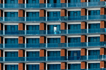 Fototapeta na wymiar Apartment house texture. High rise building background