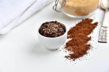 Lip scrub in small bowl made with coffee, brown sugar and honey.