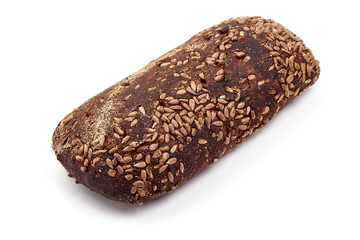 Rye bread with sesame seeds, close-up, isolated on white background