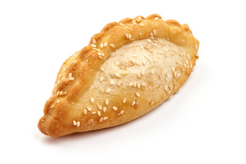 Freshly baked buns with sesame seeds, close-up, isolated on white background