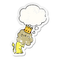cartoon lion with crown and thought bubble as a distressed worn sticker