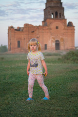 Girl on the background of the old building.
