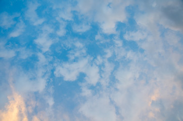 Sky background. Colorful clouds at sunrise