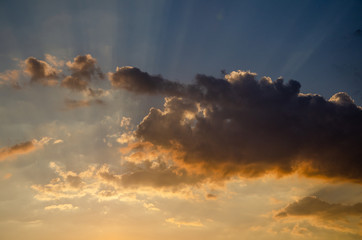 Fototapeta premium Colorful sky background with clouds at sunset