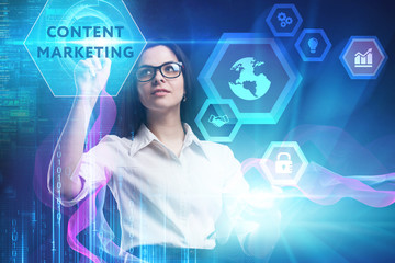 The concept of business, technology, the Internet and the network. A young entrepreneur working on a virtual screen of the future and sees the inscription: Content marketing