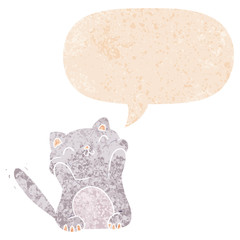 cartoon cat and speech bubble in retro textured style