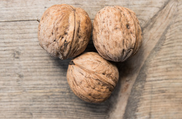 walnuts on a gray wooden board