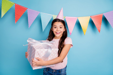Portrait astonished cute kid hold hand big present anniversary 8-march get send receive take...