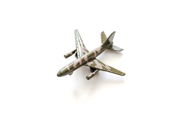 Military plane isolated on white background. Toy military plane on a white background.