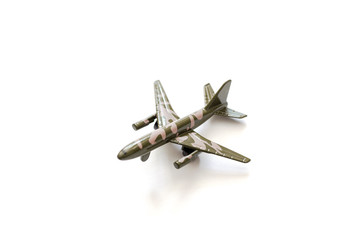 Military plane isolated on white background. Toy military plane on a white background.
