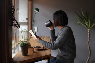 woman drinking a coffee 