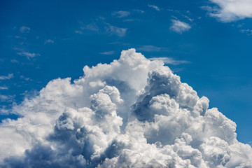 Detail of white clouds in the blue sky - Cumulonimbus
