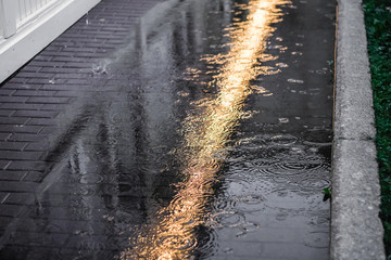 light reflection rain street asphalt urban