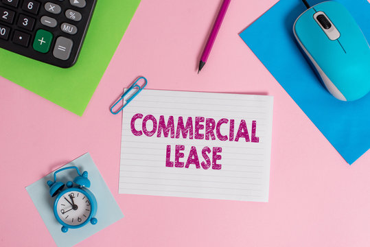 Word writing text Commercial Lease. Business photo showcasing refers to buildings or land intended to generate a profit Mouse calculator sheets clip marker note alarm clock colored background