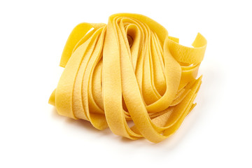 Italian Tagliatelle pasta, close-up, isolated on white background