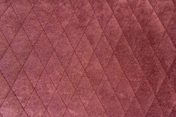The structure of purple velor fabric. Modern upholstered velvet furniture. Creative vintage...
