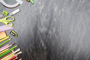 Blackboard with stationery on side