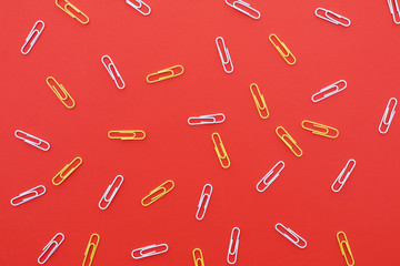 Set of yellow and white paper clips