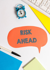 Writing note showing Risk Ahead. Business concept for A probability or threat of damage, injury,...