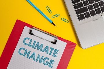Word writing text Climate Change. Business photo showcasing Increase in global average temperature Weather transformation Open laptop clipboard blank paper sheet marker clips colored background