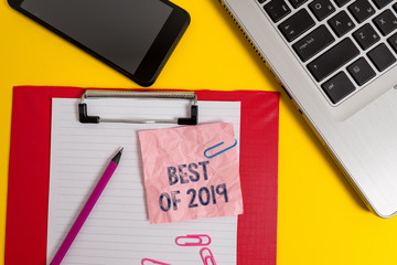 Word writing text Best Of 2019. Business photo showcasing great and marvelous things and events happened on 2019 Laptop clipboard sheet clips pencil note smartphone colored background