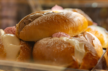 Italian sicilian pastries with chocolate and white cream.