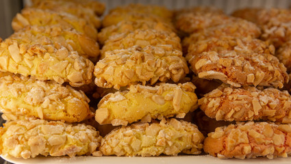 Amaretti pasta reale, italian almond pastries with colored candied fruit.