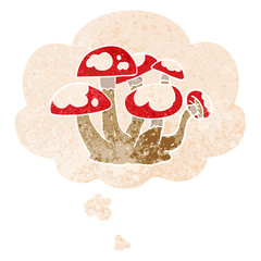 cartoon mushrooms and thought bubble in retro textured style