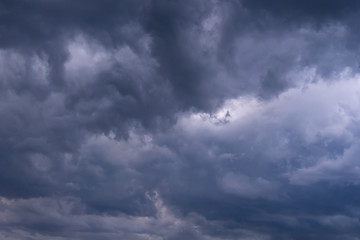 Dramatic thunderstorm clouds. Creative vintage background.