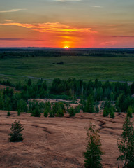 Fototapeta premium sunset over hill