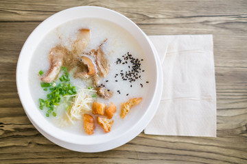 Thai style rice boiled with pork in bowl